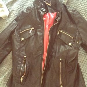 Black leather jacket with smooth pink interior